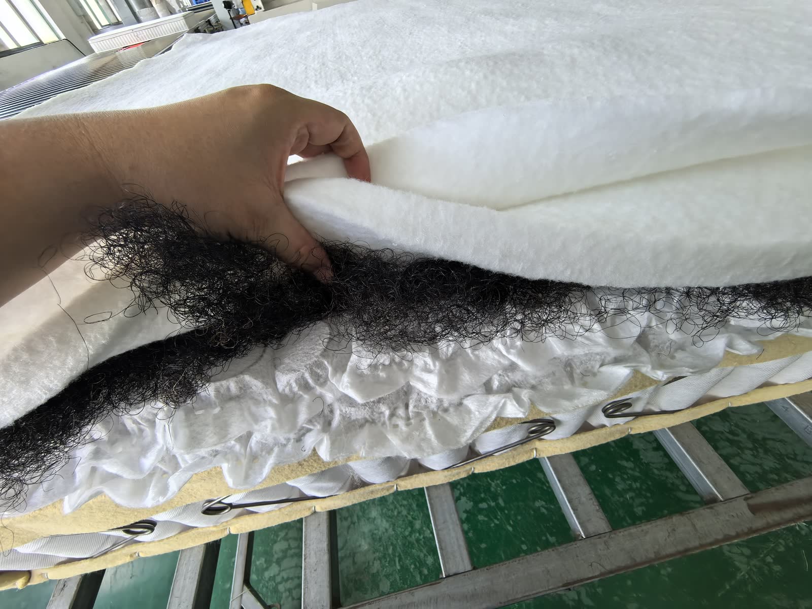 mattress material layer detail checked before compression packing