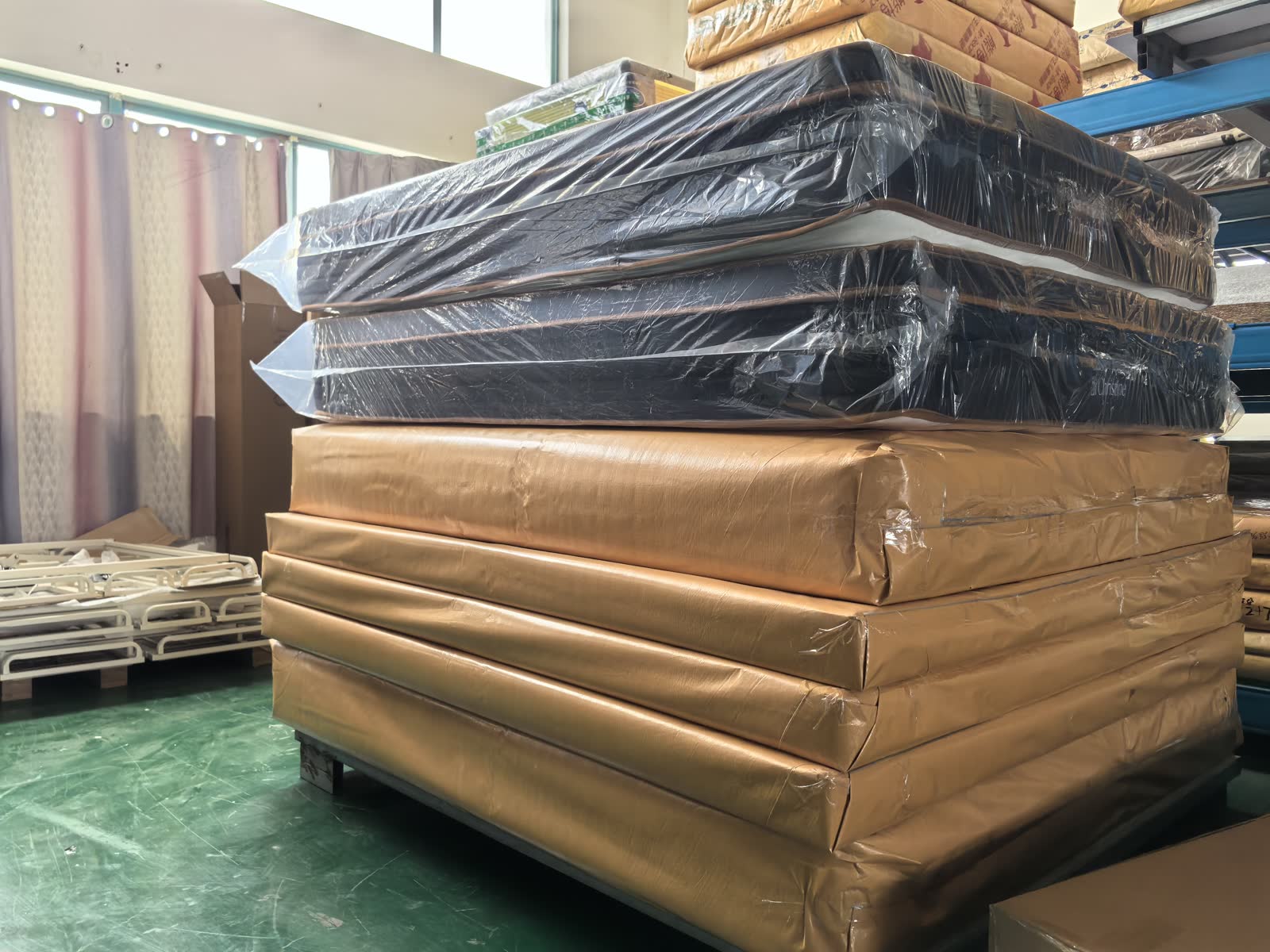Finished mattresses protected and prepared in the factory